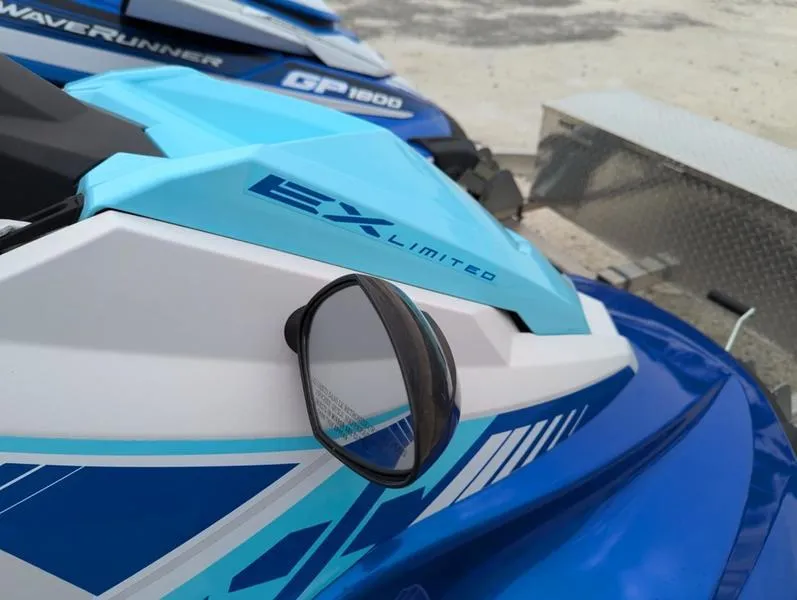 Slide: The Image of 2022 Yamaha WaveRunner EX LIMITED GP 1800, blue and white design, close-up view. - 2