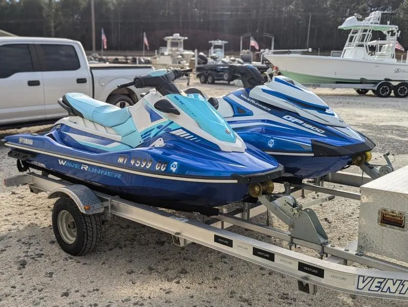 Slide: The Image of 2022 Yamaha WaveRunner EX LIMITED GP 1800 jet skis on a trailer, ready for adventure. - 24