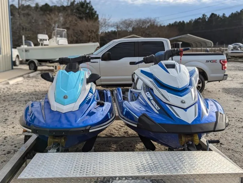 Slide: The Image of Two 2022 Yamaha WaveRunner EX LIMITED GP 1800 jet skis on a trailer. - 27