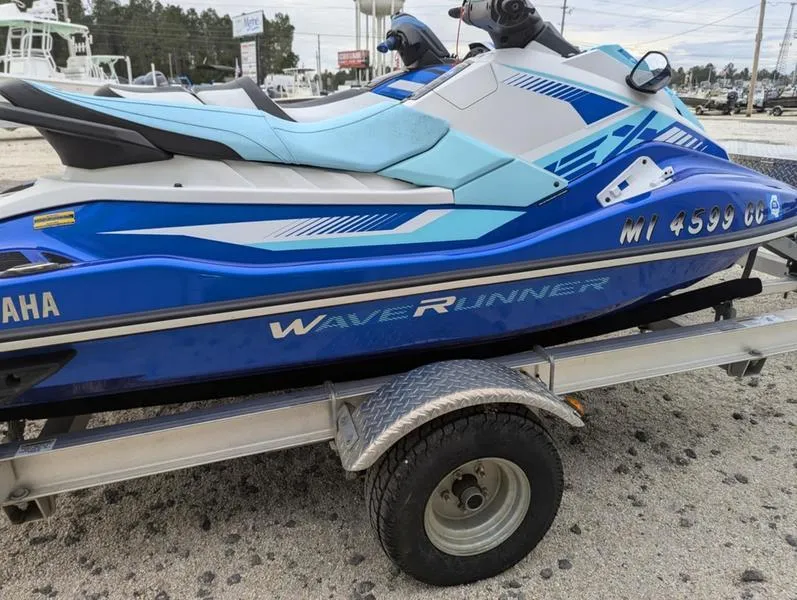 Slide: The Image of 2022 Yamaha WaveRunner EX LIMITED GP 1800 in blue on a trailer. - 28
