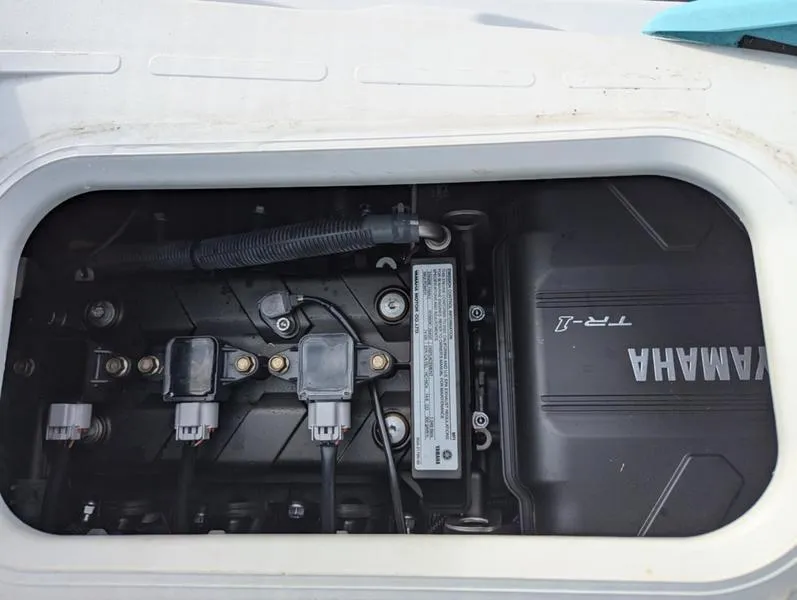 Slide: The Image of Engine compartment of a 2022 Yamaha WaveRunner EX LIMITED GP 1800, showcasing internal components. - 30
