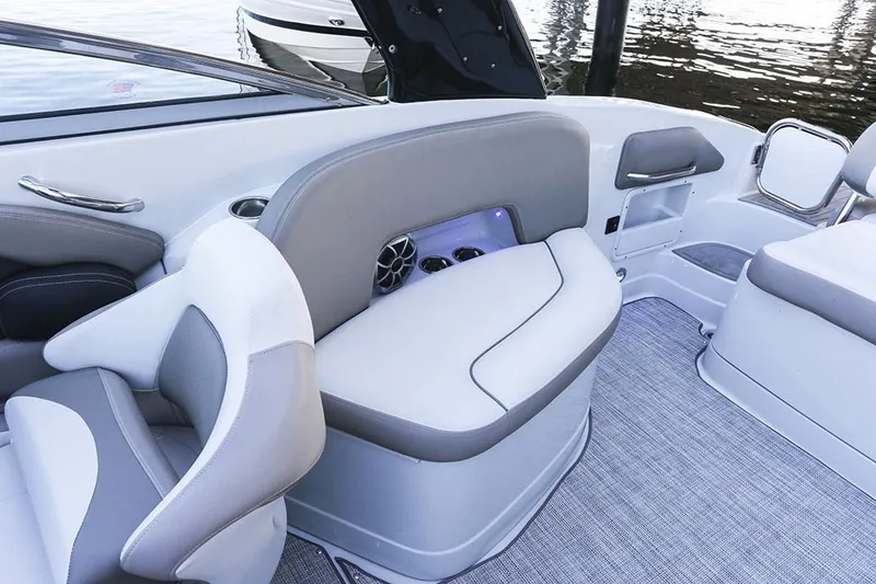 Slide: The Image of 2020 Crownline 290 SS boat side view with logo and sleek design. - 13