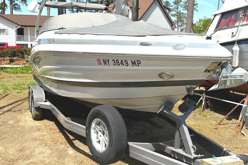 Slide: The Image of Garmin display on 2020 Crownline 290 SS boat dashboard, showing startup screen. - 19