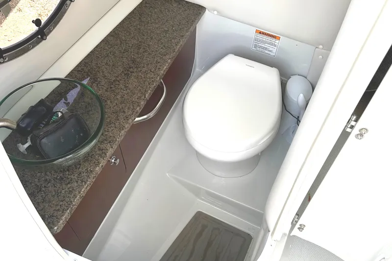 Slide: The Image of 2020 Crownline 290 SS engine compartment with Big Block V8 engine. - 24