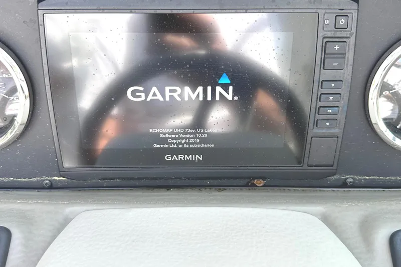 Slide: The Image of Close-up of engine serial numbers on a 2020 Crownline 290 SS boat. - 27