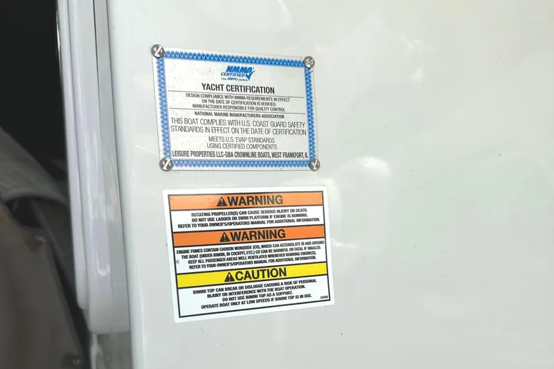 Slide: The Image of Dashboard of 2020 Crownline 290 SS boat with steering wheel and Garmin display. - 28