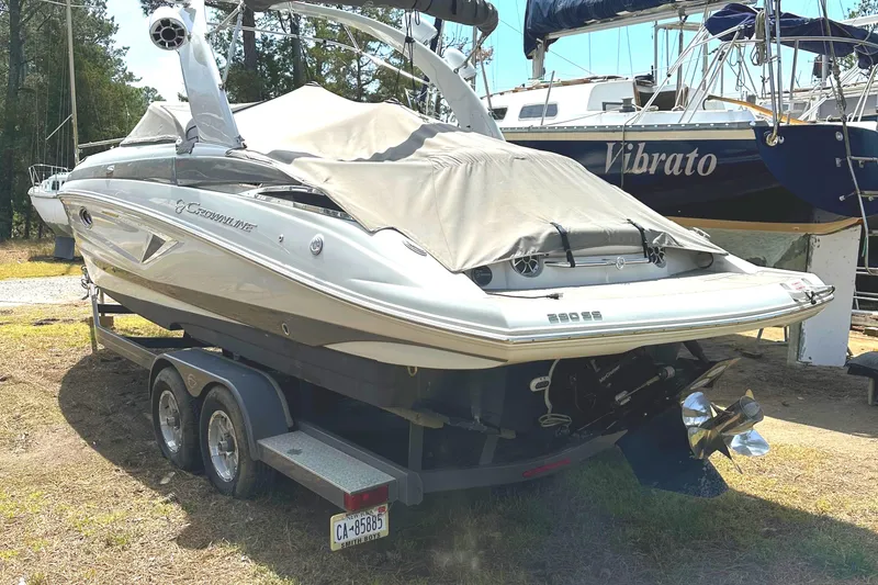 Slide: The Image of Garmin display on 2020 Crownline 290 SS boat dashboard, showing startup screen. - 29