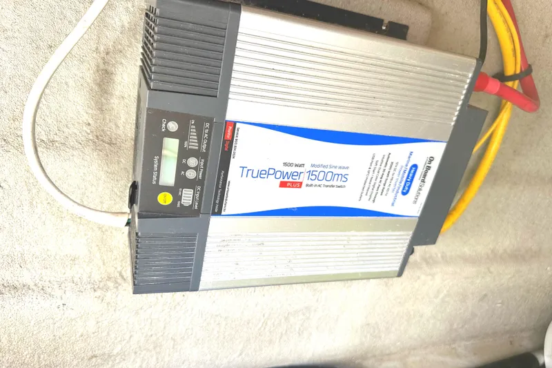 Slide: The Image of 2020 Crownline 290 SS boat interior with white cushioned seating. - 31