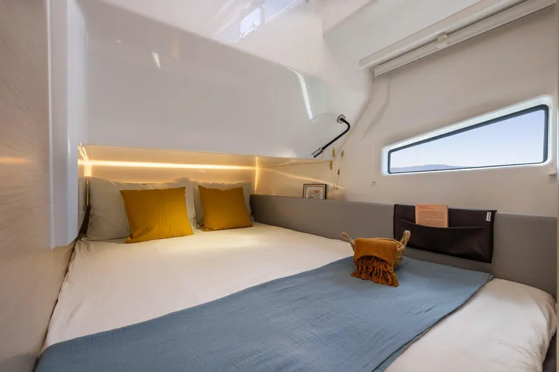 Slide: The Image of Luxurious bedroom interior of 2025 Delphia D10 Sedan with modern design and cozy bedding. - 15