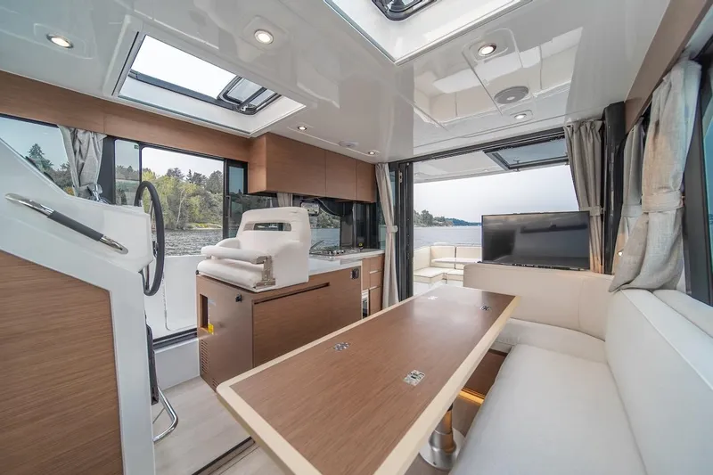 Slide: The Image of Luxurious interior of 2025 Delphia D11 Sedan yacht with modern amenities and scenic views. - 31