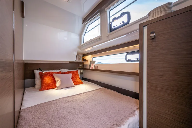 Slide: The Image of Luxurious bedroom interior of 2025 Delphia D11 SEDAN yacht with cozy bedding and modern design. - 8