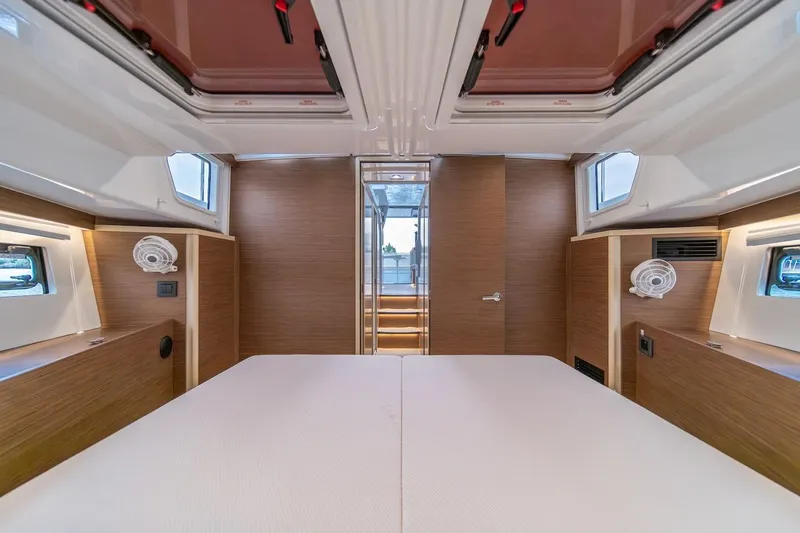 Slide: The Image of Luxurious interior of 2025 Delphia D11 SEDAN yacht with modern wood finish. - 20