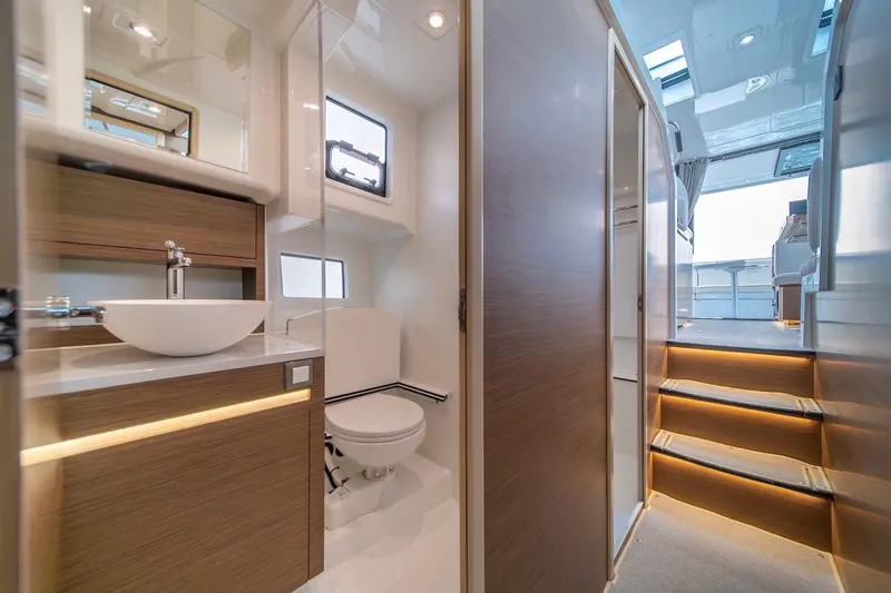 Slide: The Image of Luxurious bathroom interior of 2025 Delphia D11 SEDAN yacht with modern fixtures. - 21