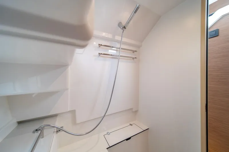 Slide: The Image of Interior of 2025 Delphia D11 SEDAN yacht bathroom with modern shower design. - 29