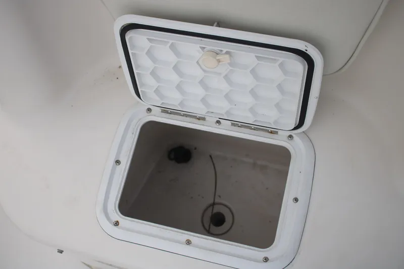 Slide: The Image of Open storage compartment on 2006 Seaswirl Striper 2601 boat. - 24