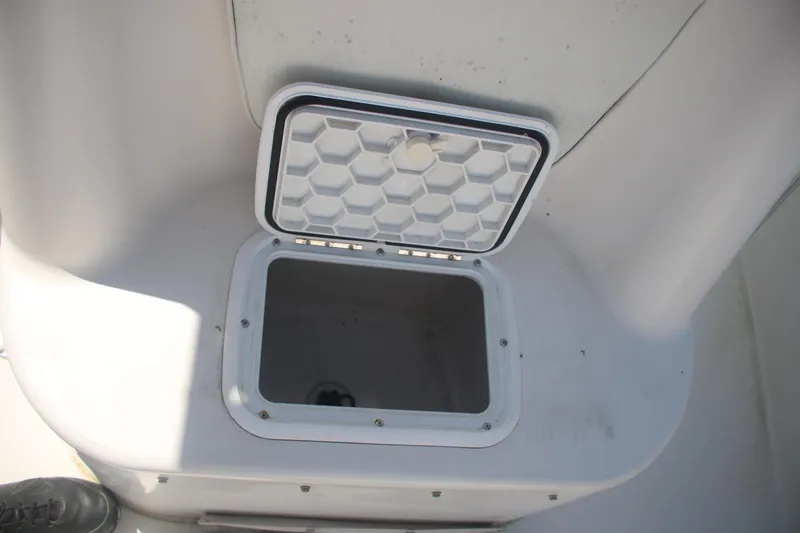 Slide: The Image of Open storage compartment on 2006 Seaswirl Striper 2601 boat. - 6