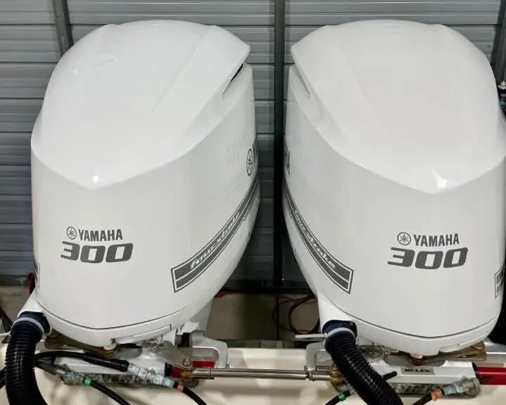 Slide: The Image of Twin Yamaha 300 outboard engines on a 2018 Sailfish 325 DC boat. - 2
