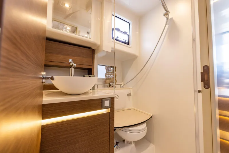 Slide: The Image of Luxurious bathroom in 2025 Delphia D11 Flybridge yacht with modern fixtures and elegant design. - 13