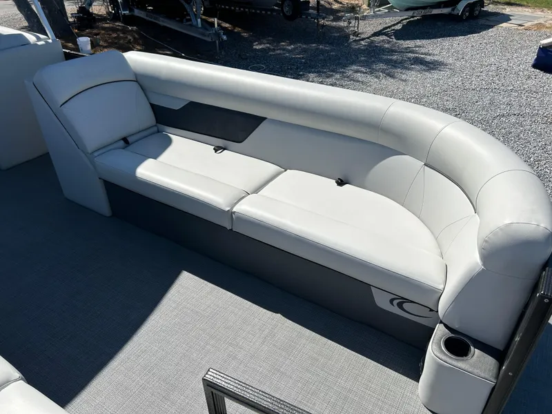 Slide: The Image of 2021 Crest 240 LX SLSC boat interior with gray seating and cup holder. - 6