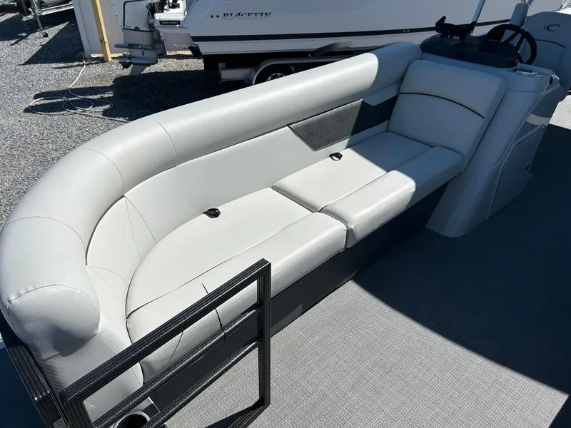 Slide: The Image of 2021 Crest 240 LX SLSC boat interior with sleek gray seating and modern design. - 7