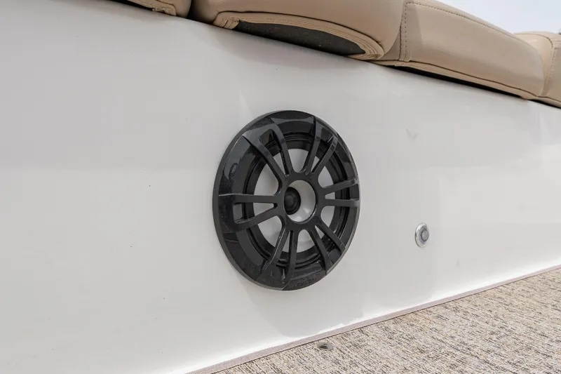 Slide: The Image of Speaker on 2022 Hurricane SS201 boat with beige seating and white paneling. - 16