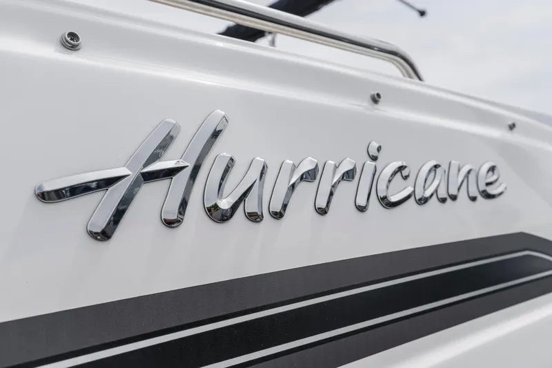 Slide: The Image of 2022 Hurricane SS201 boat logo on white surface with sleek design. - 2