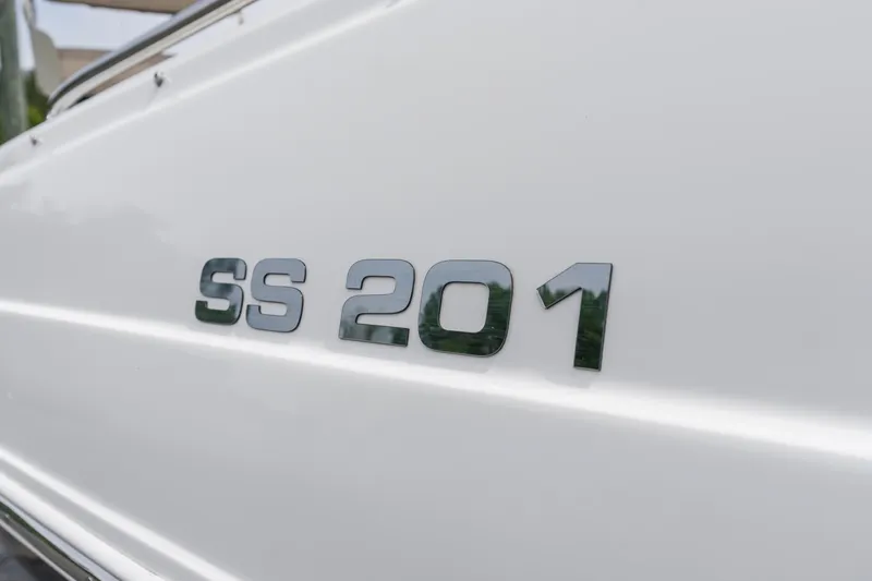 Slide: The Image of 2022 Hurricane SS201 boat model emblem on white surface. - 21