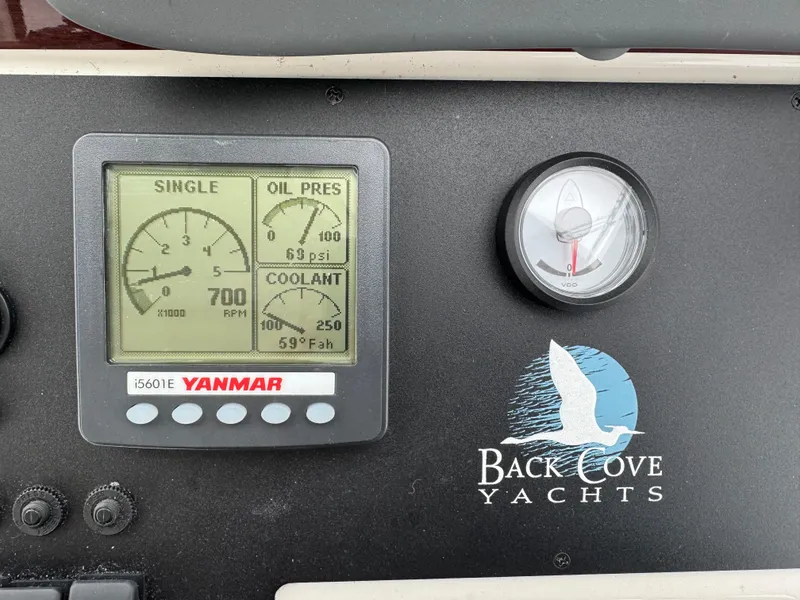 Slide: The Image of Control panel of a 2008 Back Cove 29 Hardback boat with windlass and thruster controls. - 30