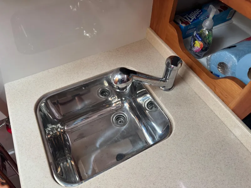 Slide: The Image of Close-up of a marine radio on a 2008 Back Cove 29 Hardback boat. - 37