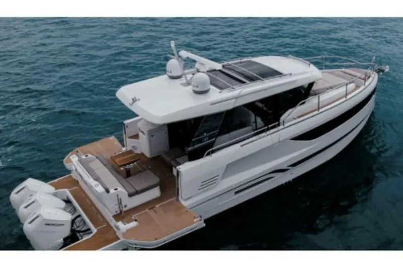 The Image of 2025 Wellcraft 44 Explorer yacht on open water, showcasing sleek design and powerful engines. - 0