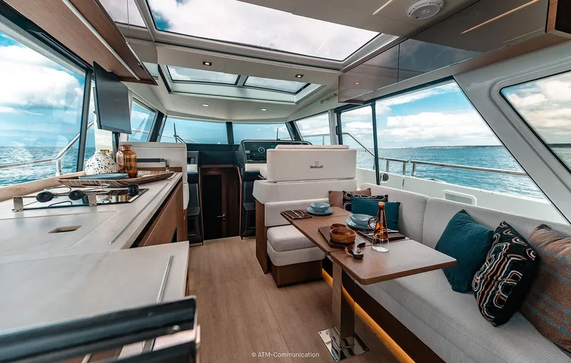 Slide: The Image of Interior of 2025 Wellcraft 44 Explorer yacht with modern design and ocean view. - 6