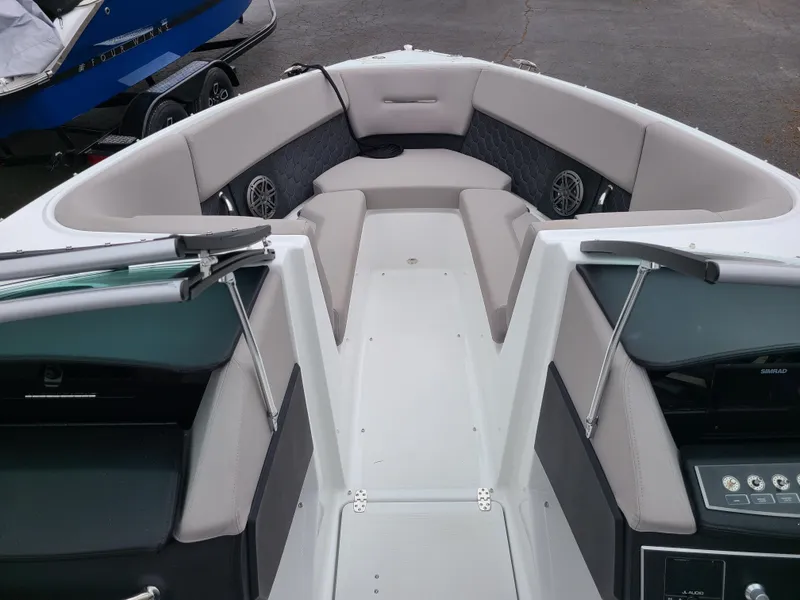 Slide: The Image of 2023 Four Winns H4 boat interior with spacious seating and modern design. - 15