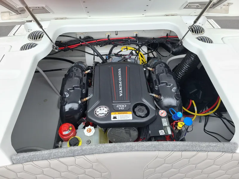Slide: The Image of 2023 Four Winns H4 boat engine compartment with Volvo Penta V6 engine. - 19