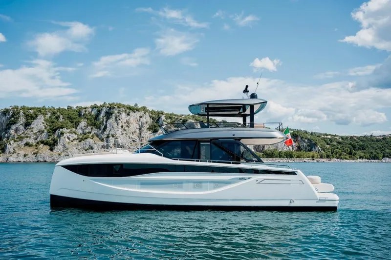 The Image of Luxurious 2025 Prestige M7 yacht cruising on serene blue waters. - 0