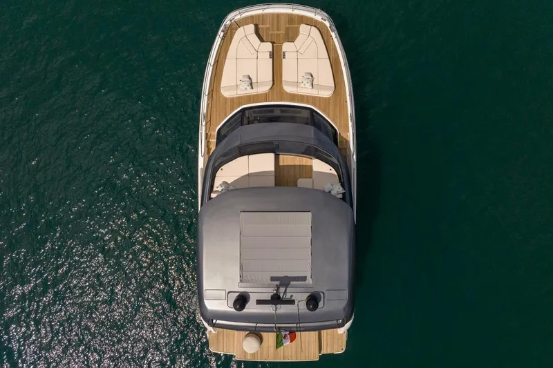 Slide: The Image of Top view of 2025 Prestige M7 yacht on calm water. - 27