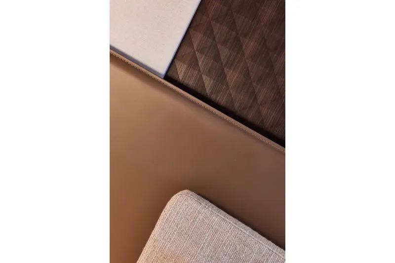Slide: The Image of Luxurious interior materials of the 2025 Prestige M7, featuring leather and textured surfaces. - 38