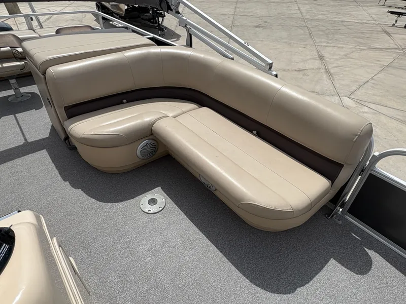 Slide: The Image of 2017 Sun Tracker Fishin' Barge 22 DLX, beige seating area on deck. - 9