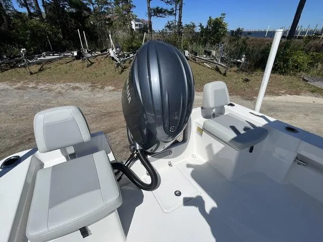 Slide: The Image of Bay Rider 239 Bay 2025 boat with Yamaha outboard motor, featuring comfortable seating. - 11