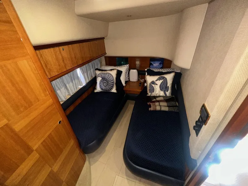 Slide: The Image of Luxurious cabin interior of 2006 Azimut 55E yacht with twin beds and nautical decor. - 20