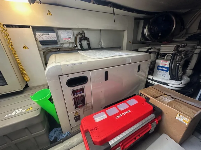 Slide: The Image of Engine room of a 2006 Azimut 55E yacht with tools and equipment. - 25