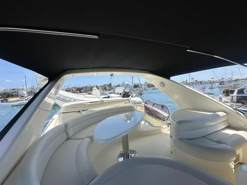 Slide: The Image of Luxurious 2006 Azimut 55E yacht interior with elegant seating and waterfront view. - 32