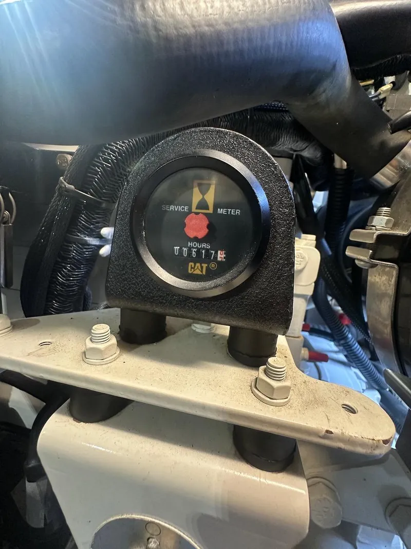 Slide: The Image of Service meter on 2006 Azimut 55E yacht engine, displaying 617 hours. - 43