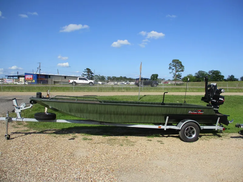 Slide: The Image of 2025 Gator Tail 2054 Extreme boat on trailer in outdoor setting. - 1