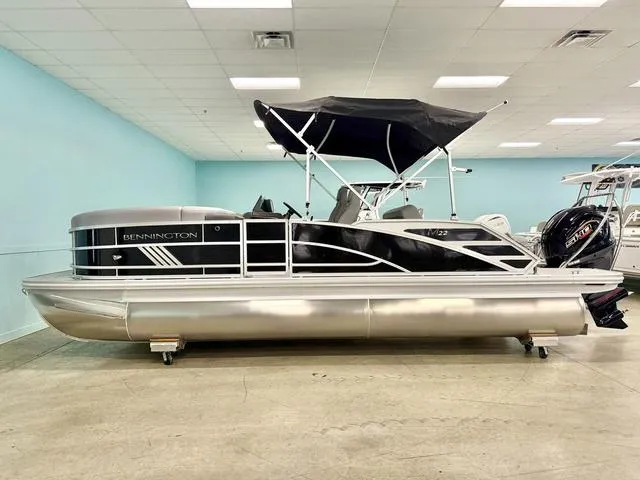 Slide: The Image of Top view of 2025 Bennington M Swingback 22 MSB boat layout. - 1