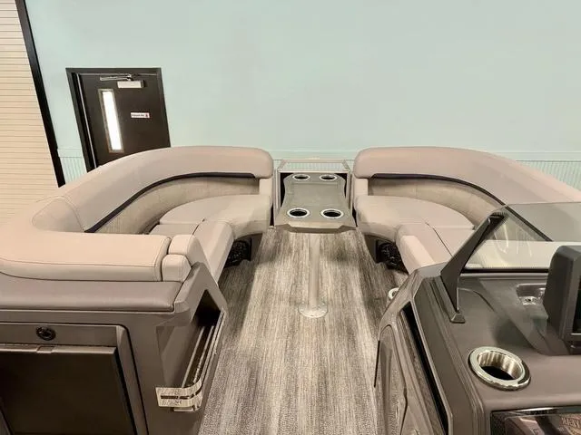 Slide: The Image of 2025 Bennington M Swingback 22 MSB interior with plush seating and cup holders. - 4
