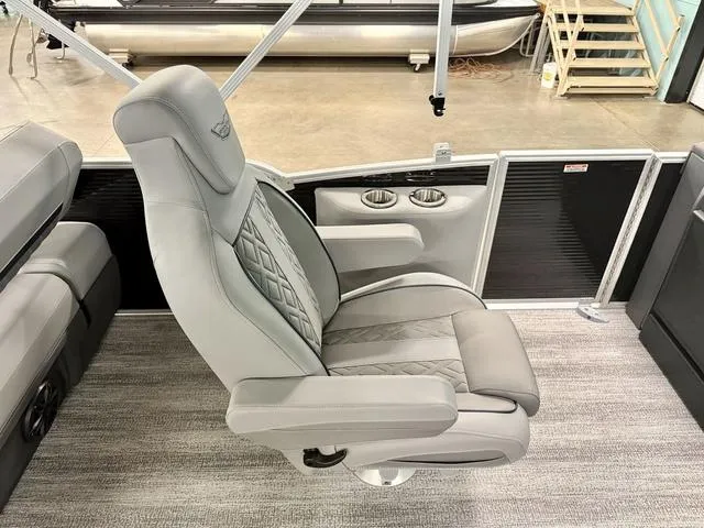 Slide: The Image of Luxury seating on 2025 Bennington M Swingback 22 MSB pontoon boat, featuring elegant design and comfort. - 9