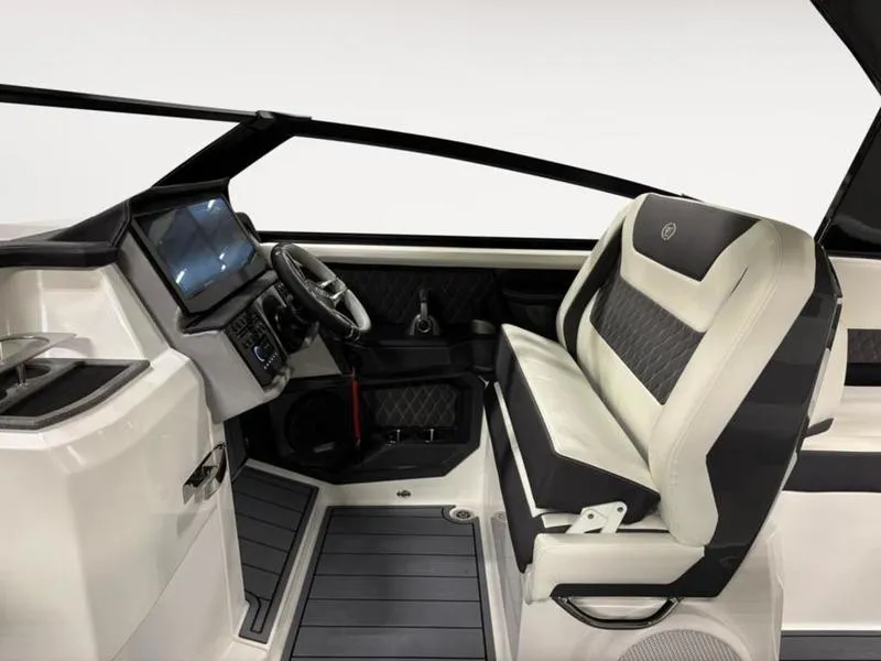 Slide: The Image of Interior of 2025 Cobalt R31 boat, featuring modern dashboard and luxurious seating. - 11