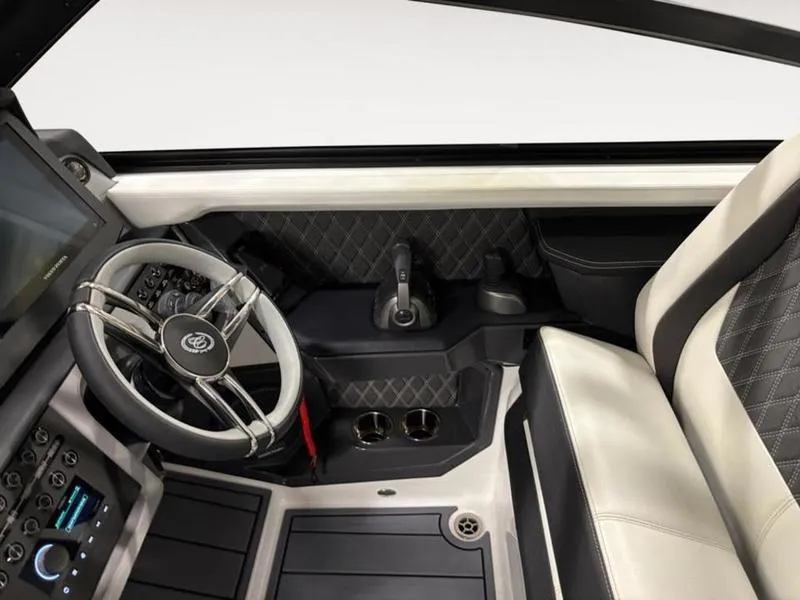 Slide: The Image of 2025 Cobalt R31 interior, featuring a modern steering wheel and luxurious seating with quilted design. - 12