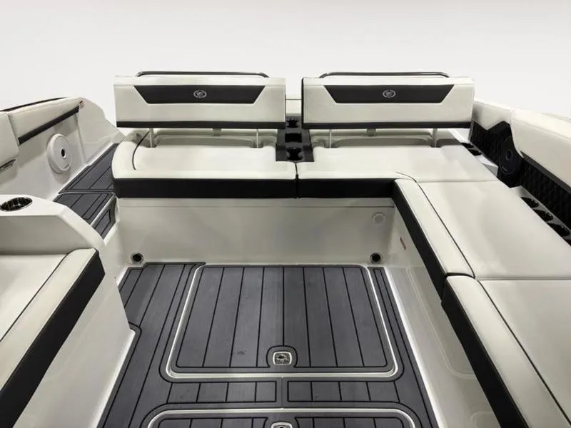 Slide: The Image of 2025 Cobalt R31 boat interior with sleek seating and modern design. - 14