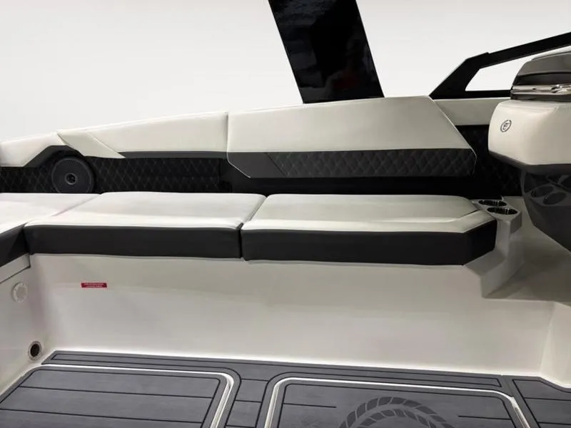 Slide: The Image of 2025 Cobalt R31 boat interior with sleek seating and modern design. - 16